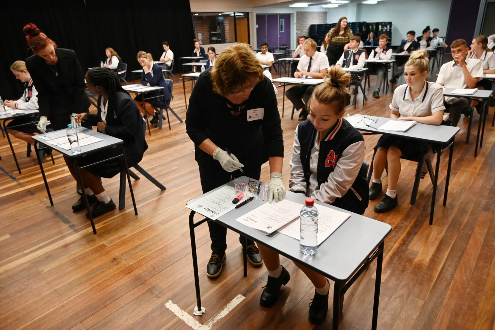 Year 12 students at Penola Catholic College in Emu Plains finish their English HSC exam