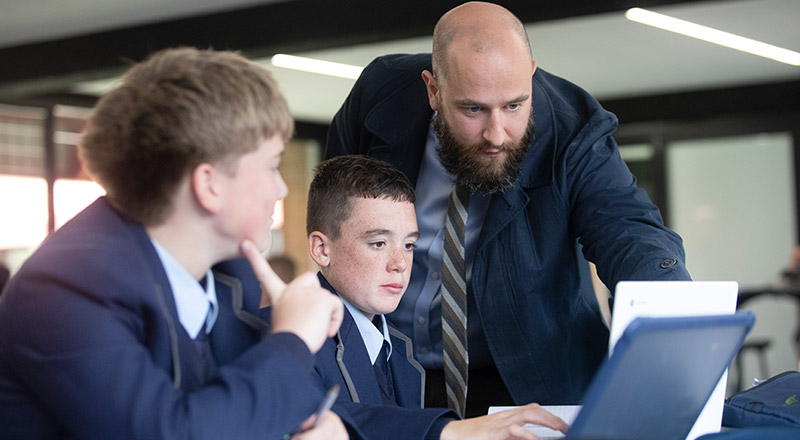 Penola Catholic College Emu Plains teacher supporting students in class
