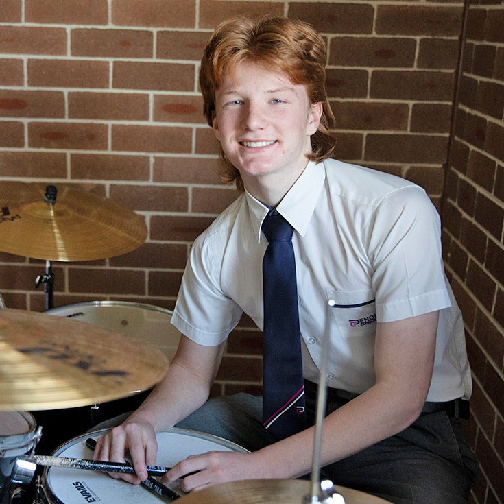 Penola Catholic College Emu Plains student playing drums