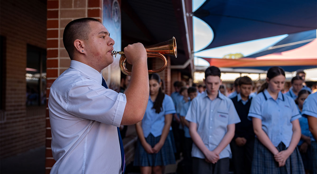 Cordell Dean playing the bugle